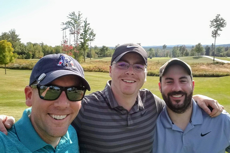 About Our Agency - Portrait of The Insurance Outlet Founder and Fellow Employees on the Golf Course