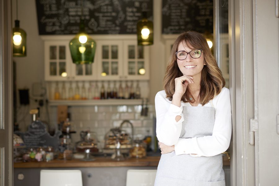 woman-in-cafe-new-hampshire-business-insurance-the-insurance-outlet
